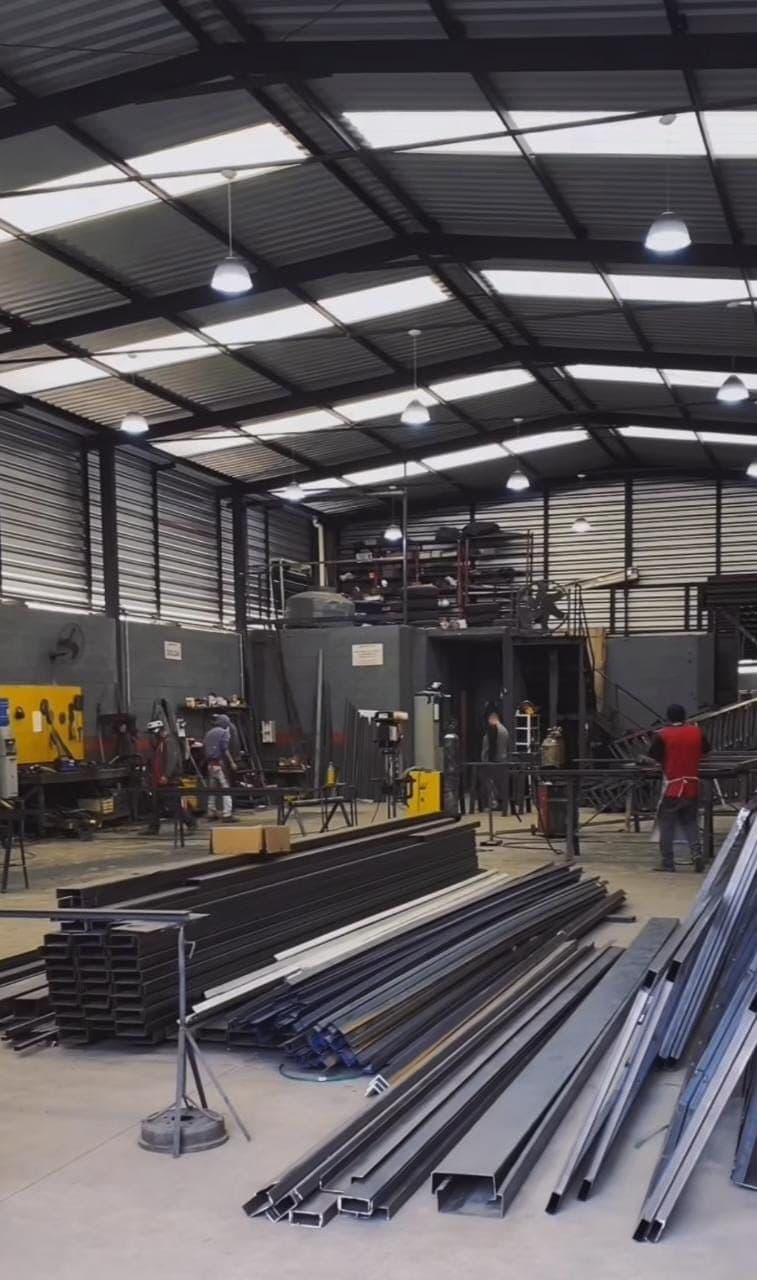 Steel sections and profiles stocked on the workshop floor