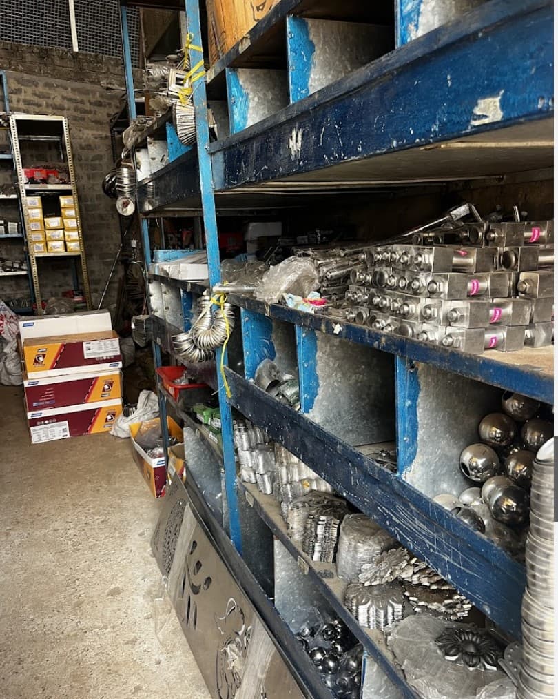 Warehouse interior stocked with metal supplies and hardware