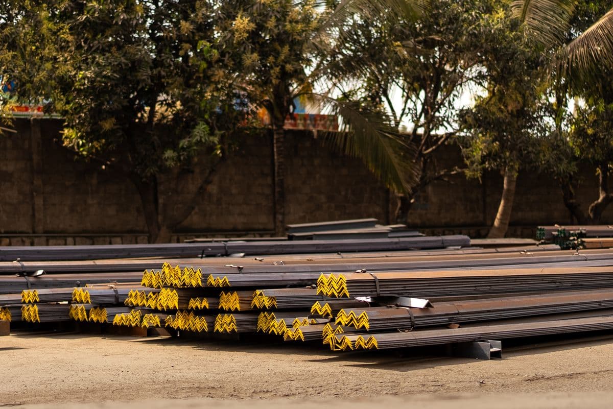 Steel bars stacked in an industrial yard
