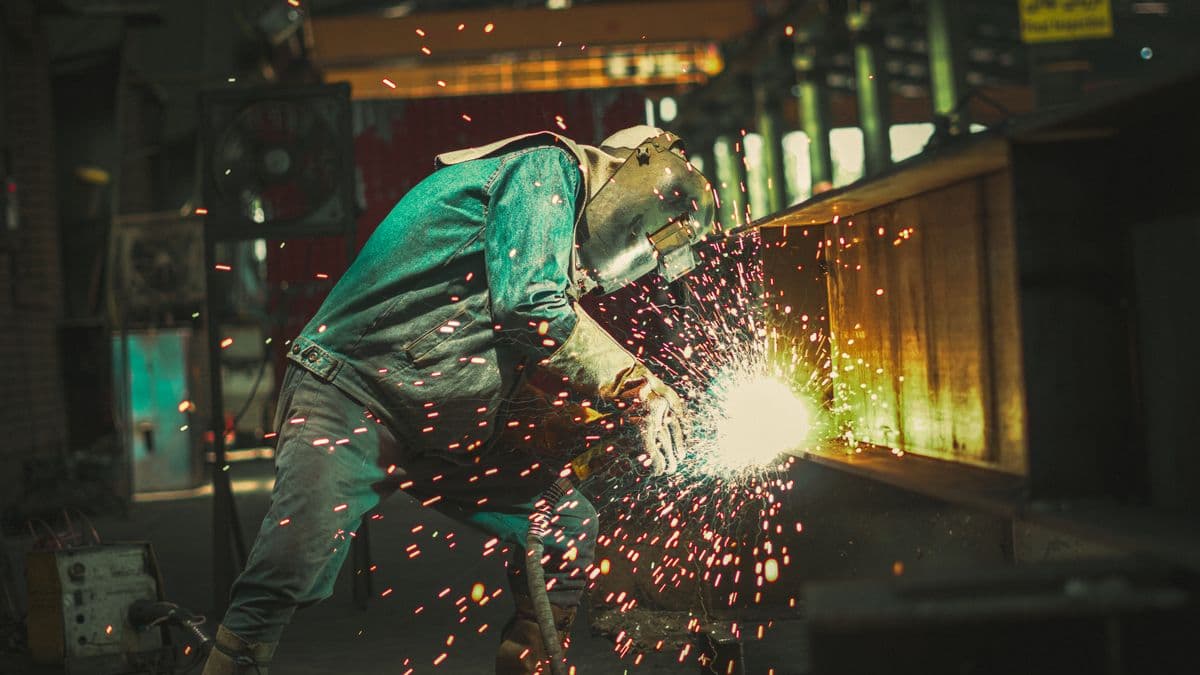 Industrial fabrication with welding sparks